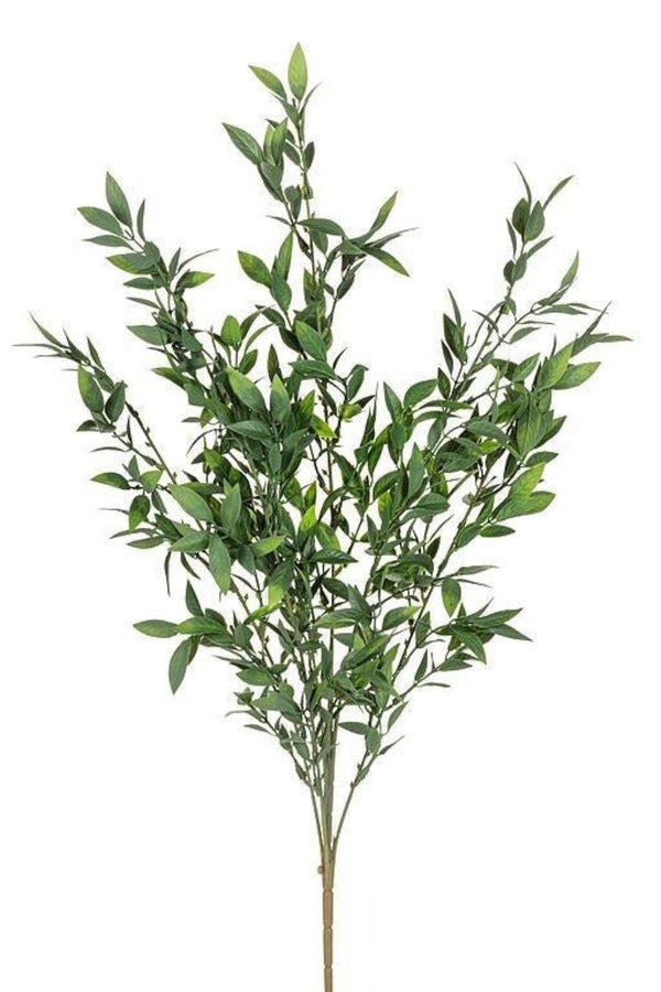 Artificial green plant branch on a white background