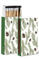Matches with a decorative box featuring pine branches and cones on a white background