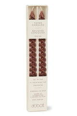 Packaged set of two brown twisted candles with Abbott branding on a white background