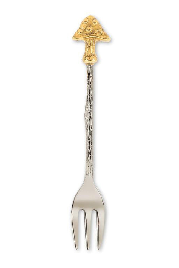 Decorative fork with gold top on a white background