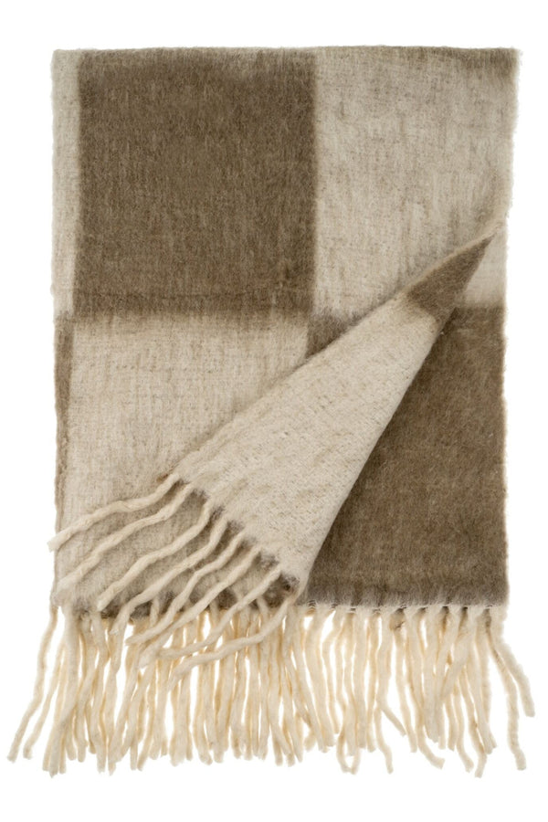 Plaid blanket with fringes on a white background