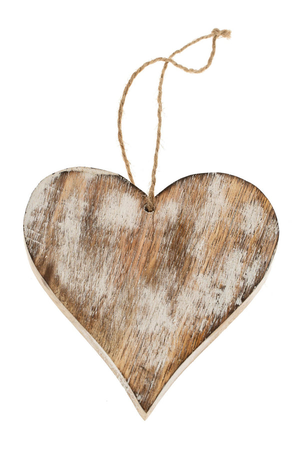 Wooden heart-shaped hanging ornament on a white background