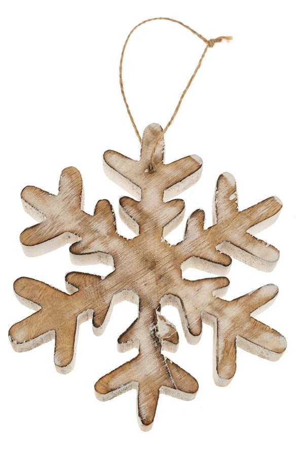 Wooden snowflake ornament on a white background
