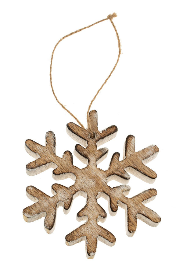 Wooden snowflake ornament on a white background