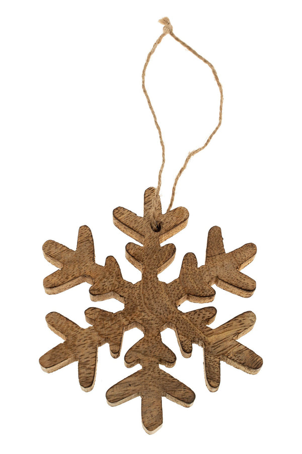 Wooden snowflake ornament on a white background