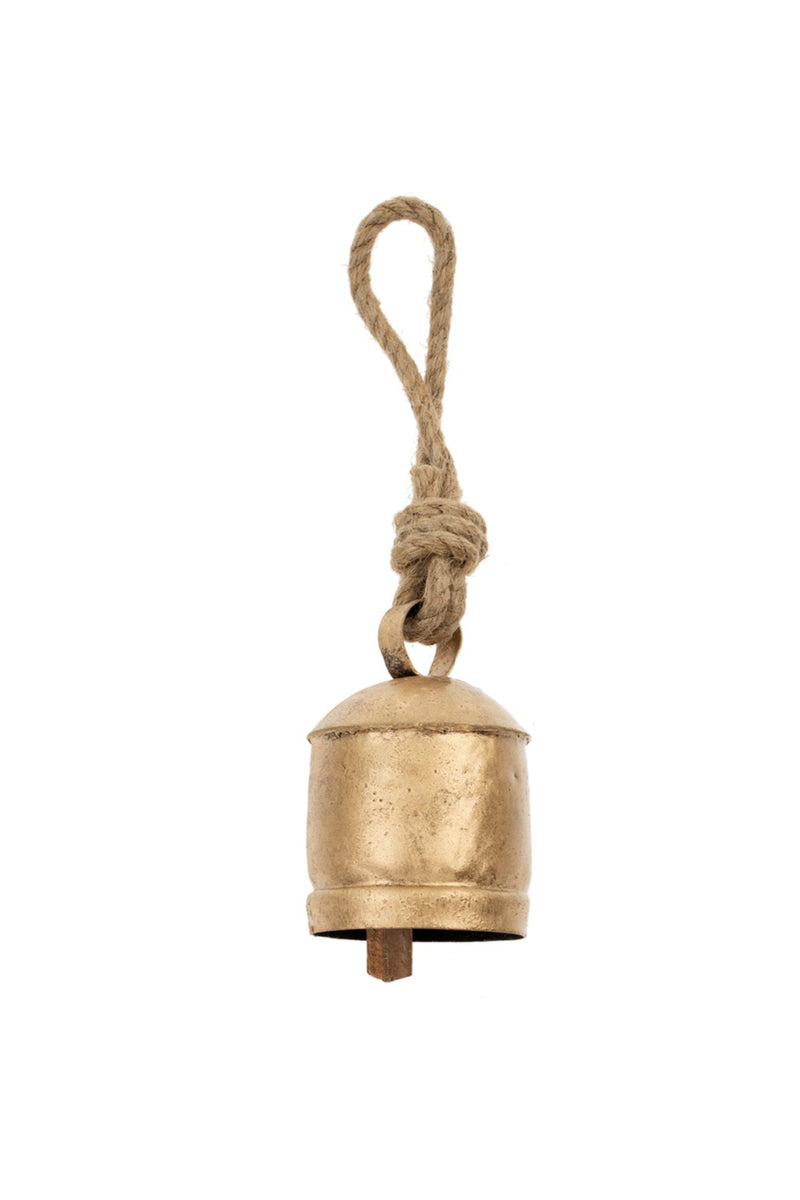 Brass bell with a rope on a white background
