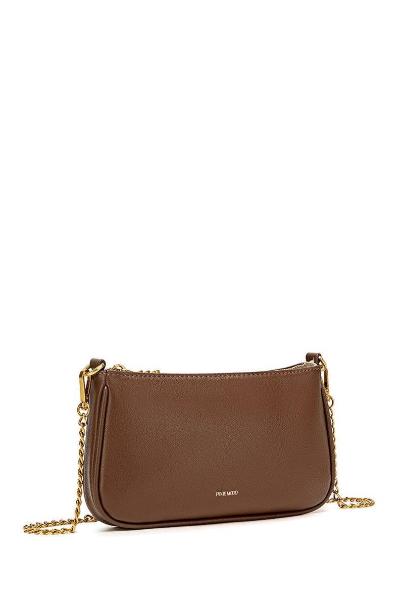 Brown leather handbag with gold chain on a white background
