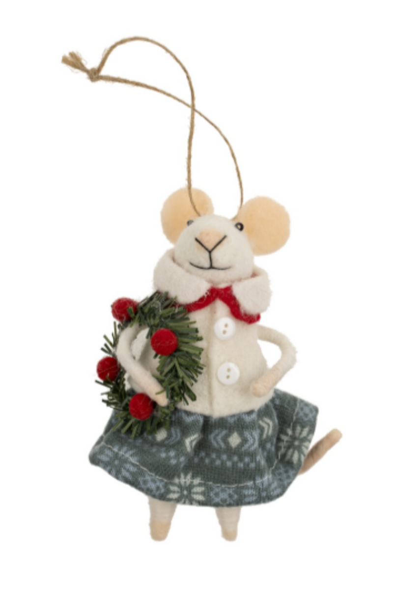 Felt mouse ornament hanging from a string wearing a white shirt and blue skirt holding a wreath on a white background