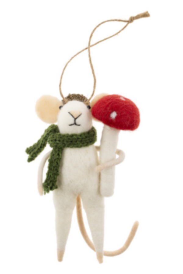 Felted white mouse figurine on a string wearing a green scarf and an acorn cap, holding a red and white mushroom against a white background