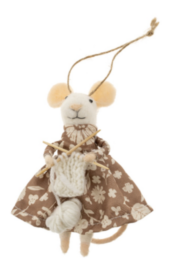 Felted white mouse figurine on a string wearing a brown and cream floral dress, knitting a cream scarf on a white background