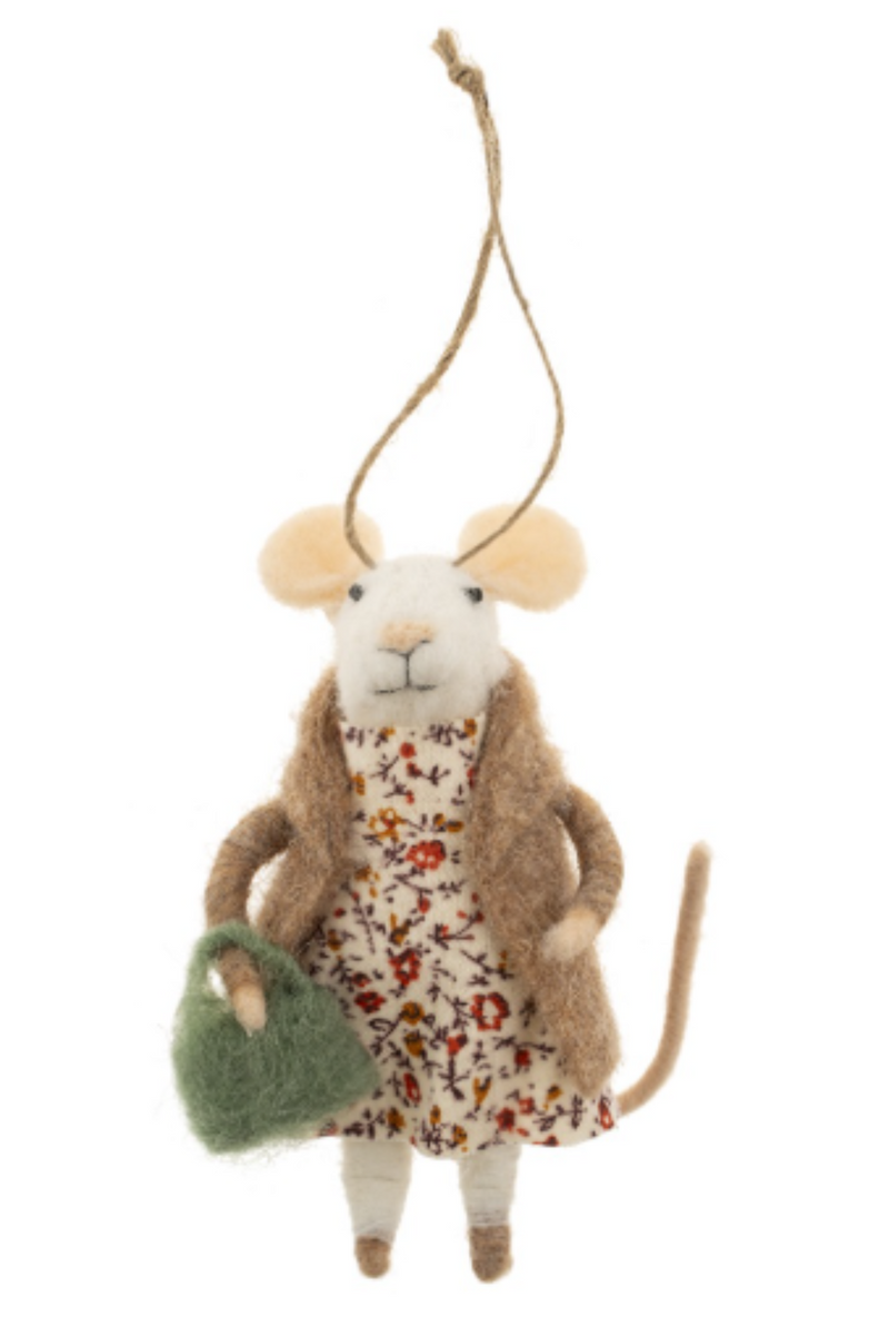 Felted white mouse figurine on a string wearing a floral dress and beige coat, carrying a green bag on a white background