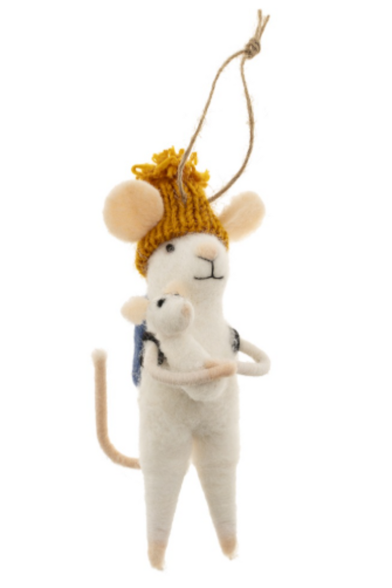 Felted white mouse figurine on a string wearing a yellow knitted hat and blue backpack, carrying a baby mouse on a white background