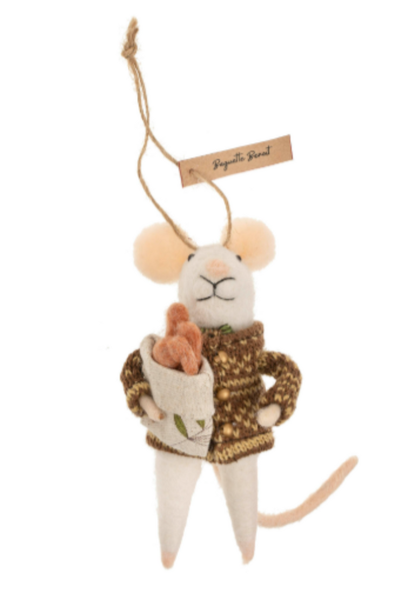 Felted white mouse figurine on a string  wearing a knitted cardigan sweater, holding a bag of baguettes on a white background
