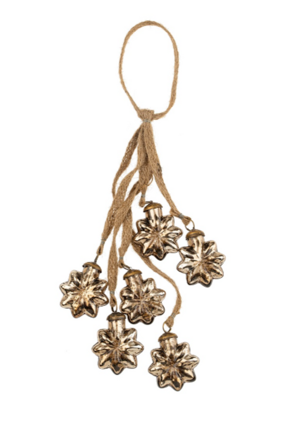 Decorative gold hanging ornament with star-shaped ends on a white background