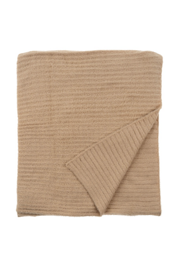 Beige knitted blanket on a white background