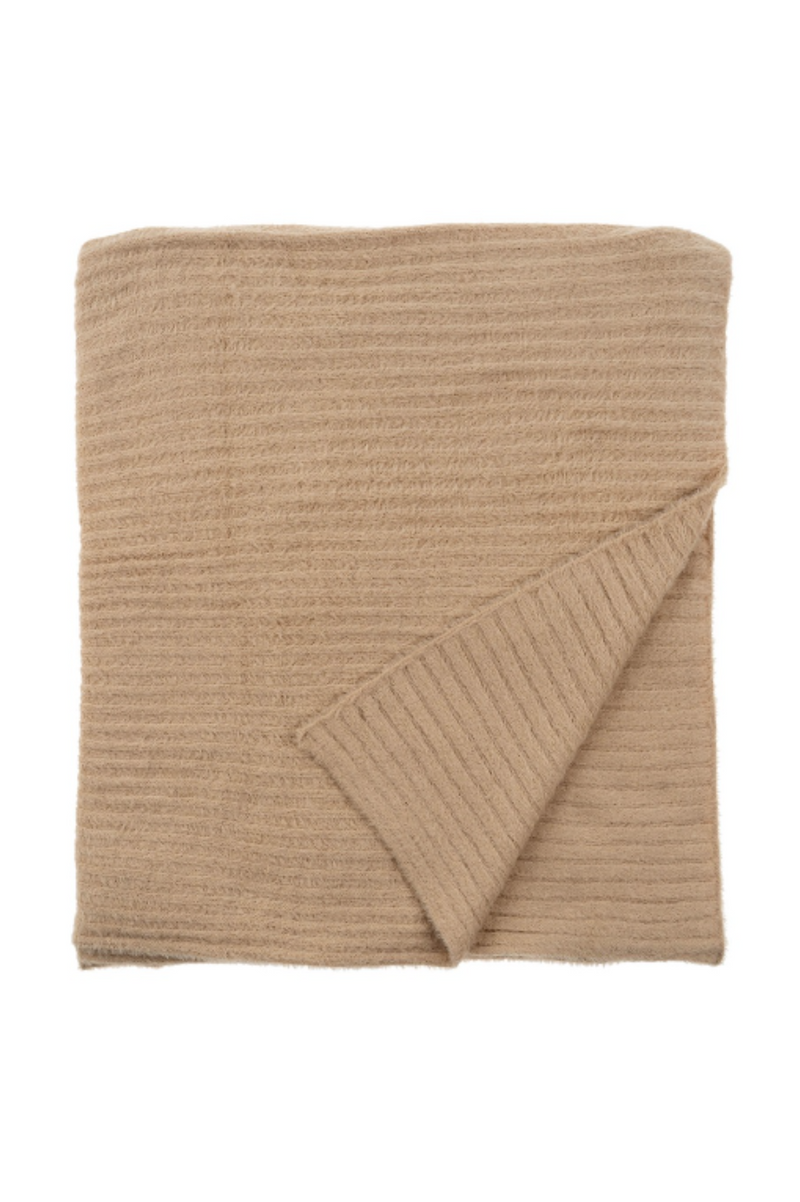 Beige knitted blanket on a white background