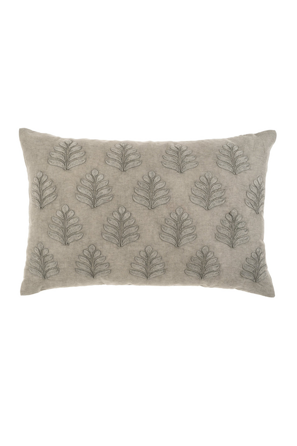 Gray pillow with leaf pattern on a white background