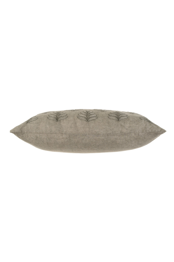 Textured rectangular pillow with leaf pattern on a white background