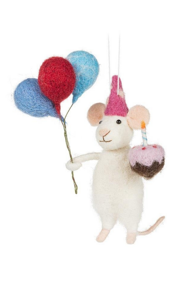 White felted mouse with a party hat, balloons, and a cupcake on a white background