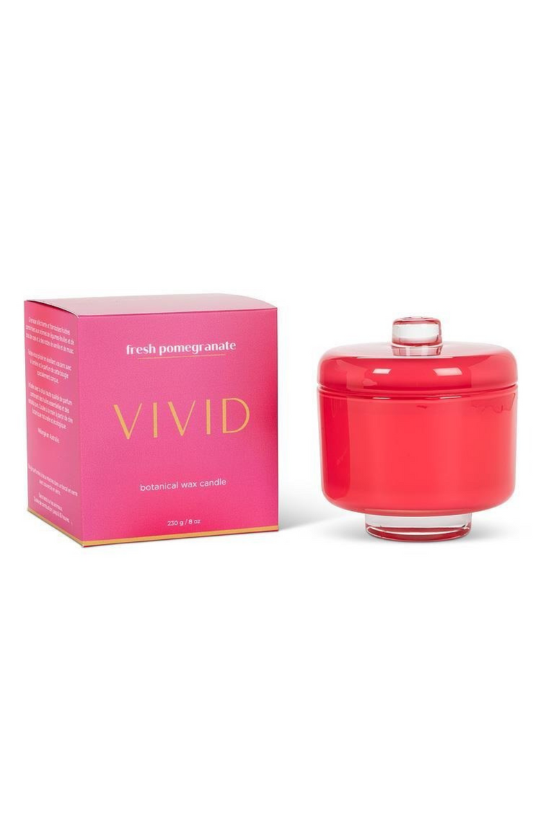 Pink candle with a pink box labeled 'Vivid' on a white background