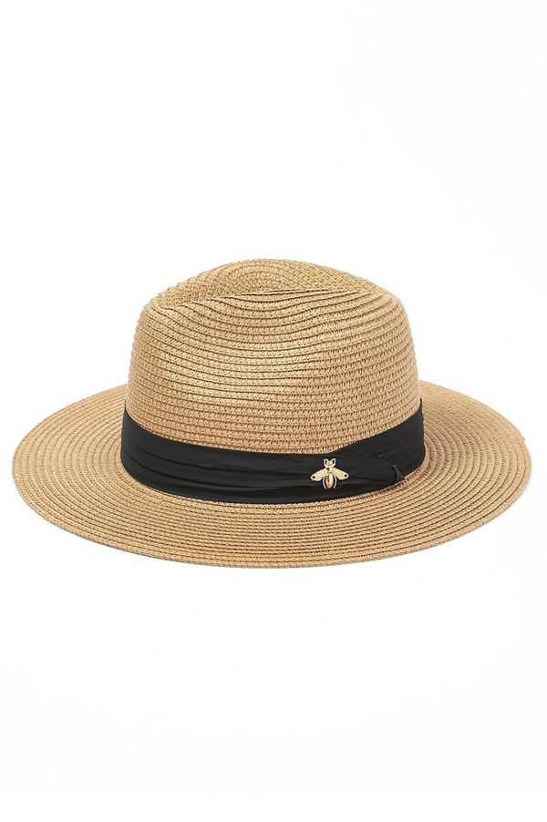 Beige straw hat with a black band on a white background