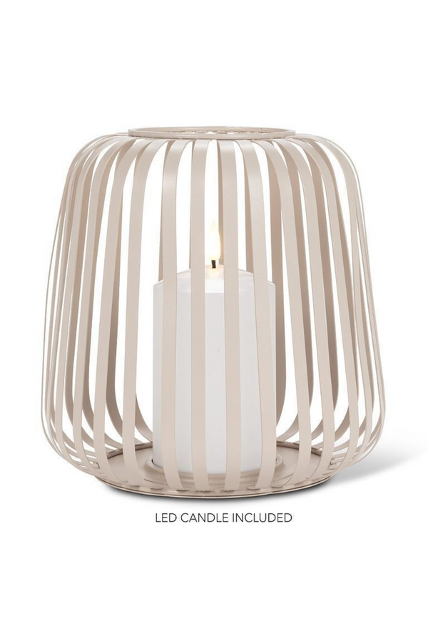 Decorative candle holder with LED candle on a white background