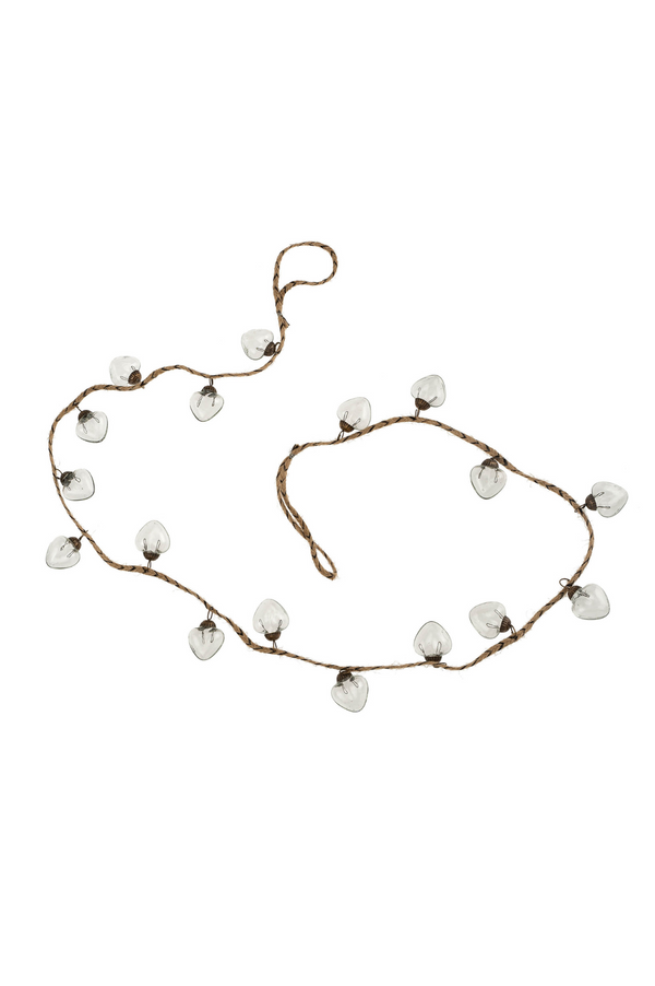 Garland of clear glass ornaments on a white background.