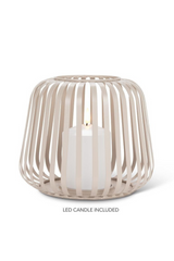 Decorative candle holder with a lit LED candle on a white background