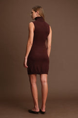 Woman wearing a brown dress against a matching brown background