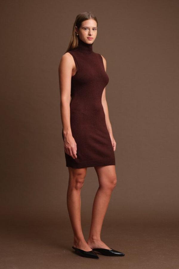 Woman wearing a brown dress against a brown background