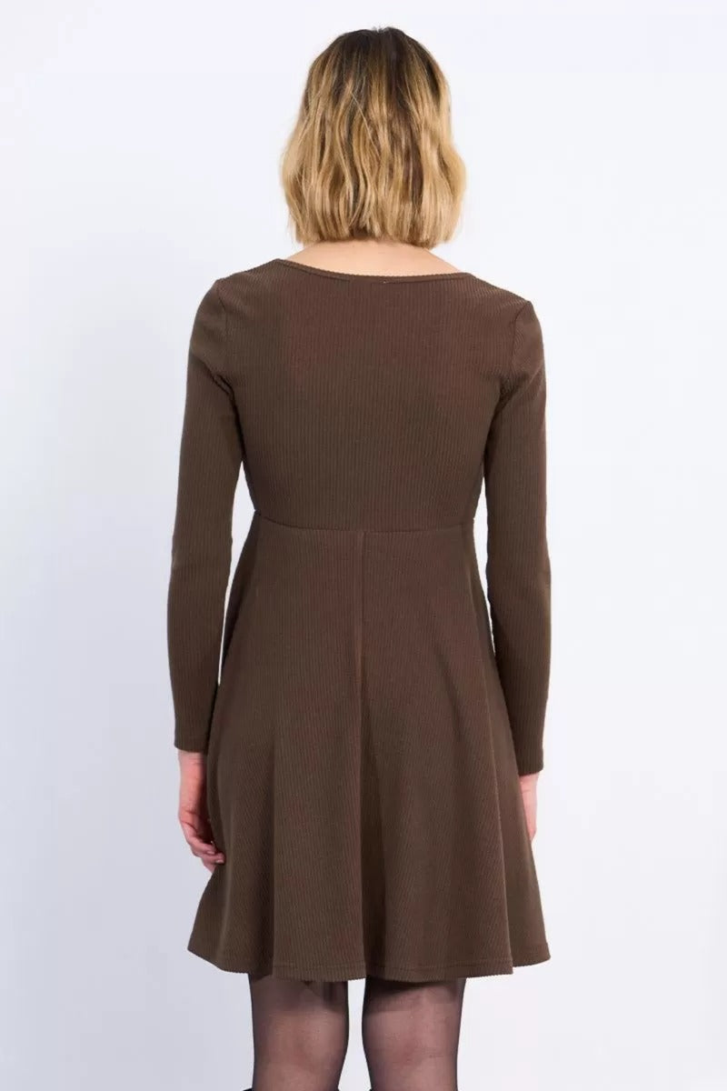 Brown dress worn by a person on a white background