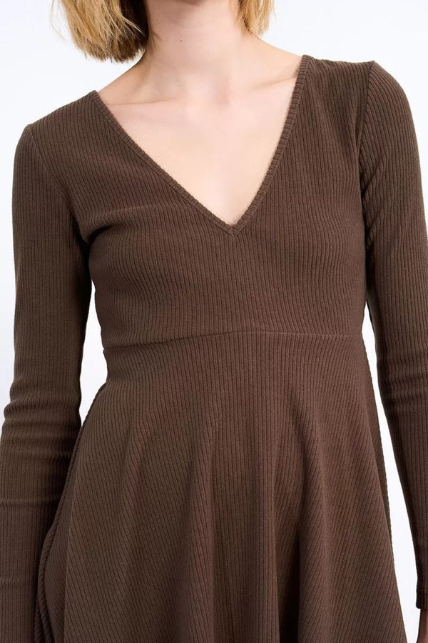 Brown ribbed long-sleeve dress on a white background