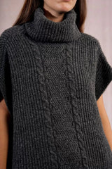 Dark gray knitted sweater with a pattern on a neutral background